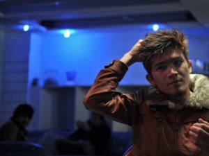 Man styles hair Kabul