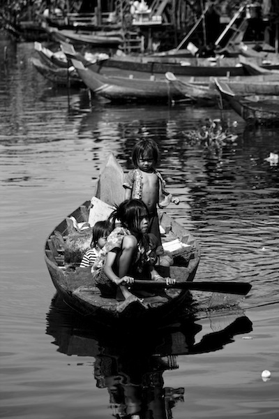 Children on a boat in SIeam Reap