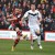 Marc Pugh shoots at the Doncaster goal