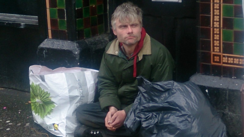 Homeless man on Old Christchurch road in Bournemouth Photo: Al Mansaray