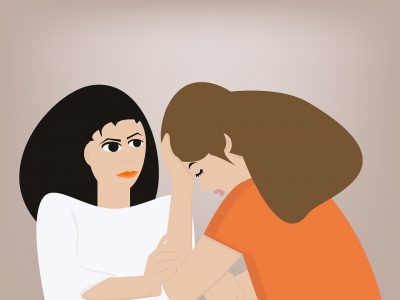 An image of a mental health worker consoling a patient