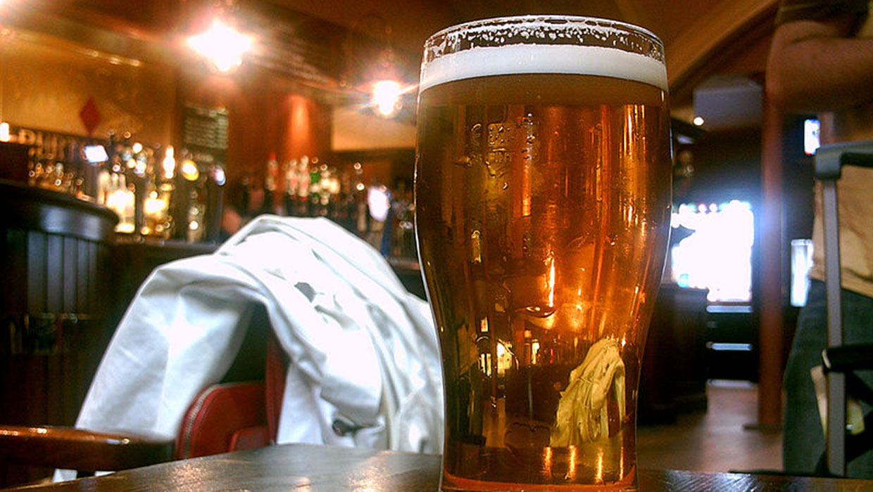 A pint of beer served in a British pub