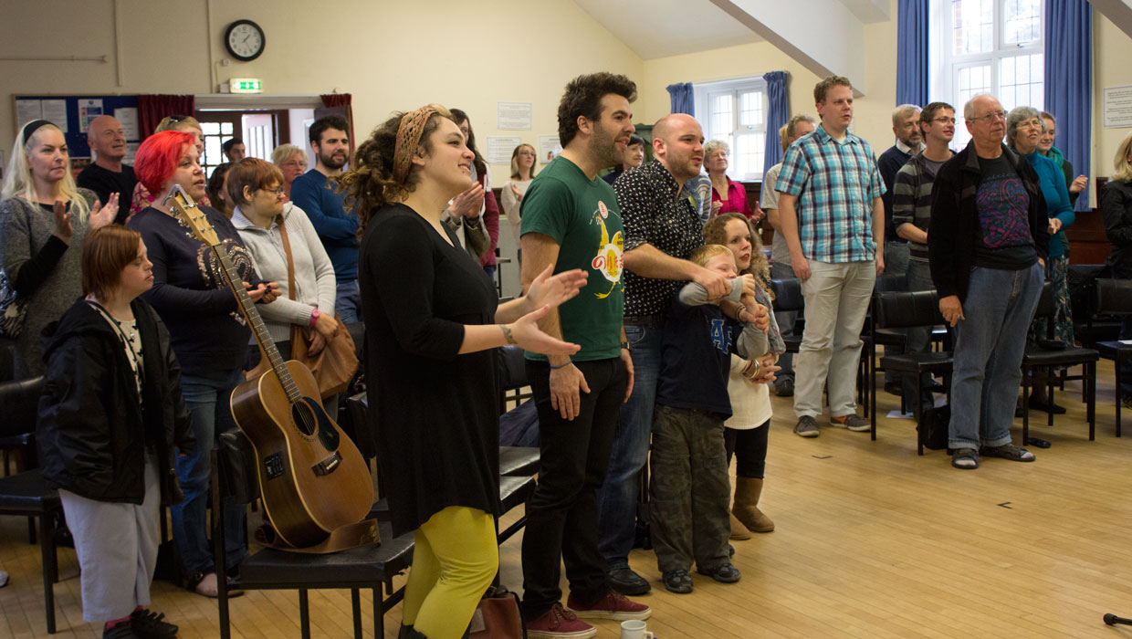 The congregation sings pop songs at Sunday Assembly Bournemouth in Winton