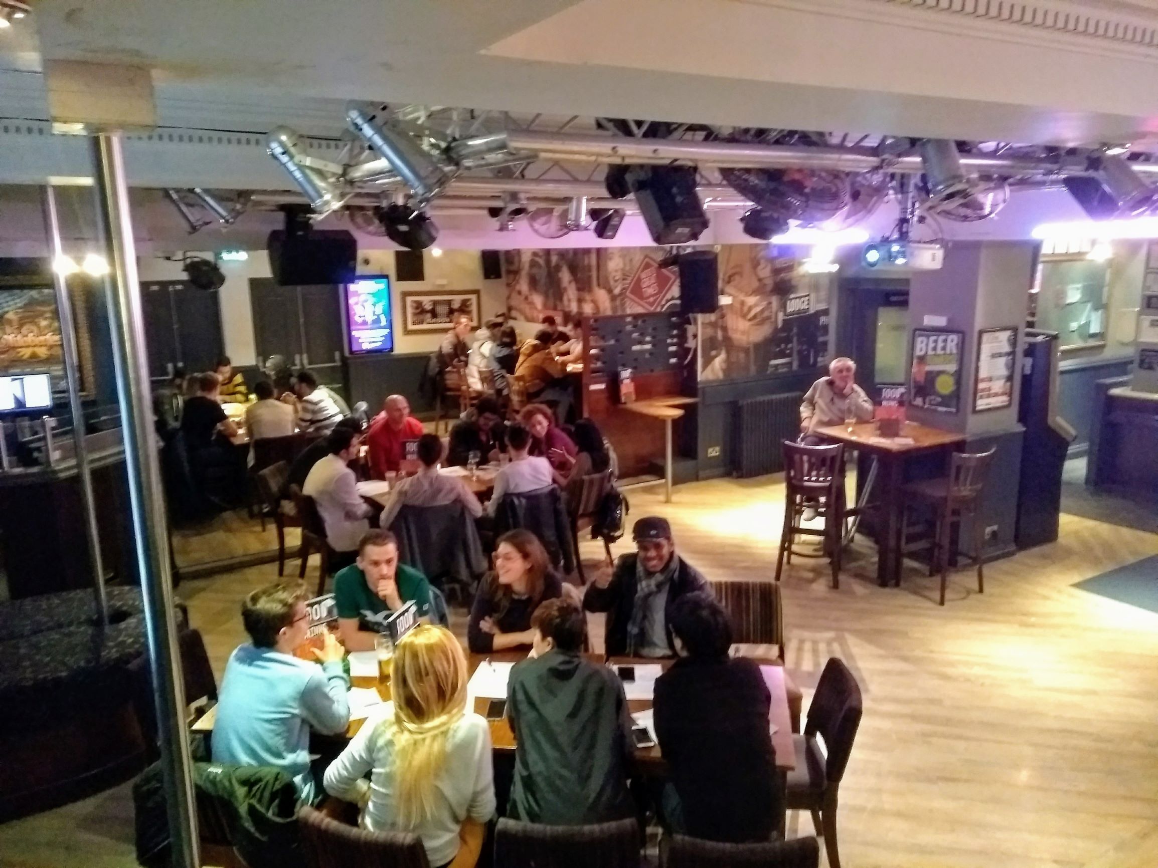 A picture of people learning English in a Bournemouth bar