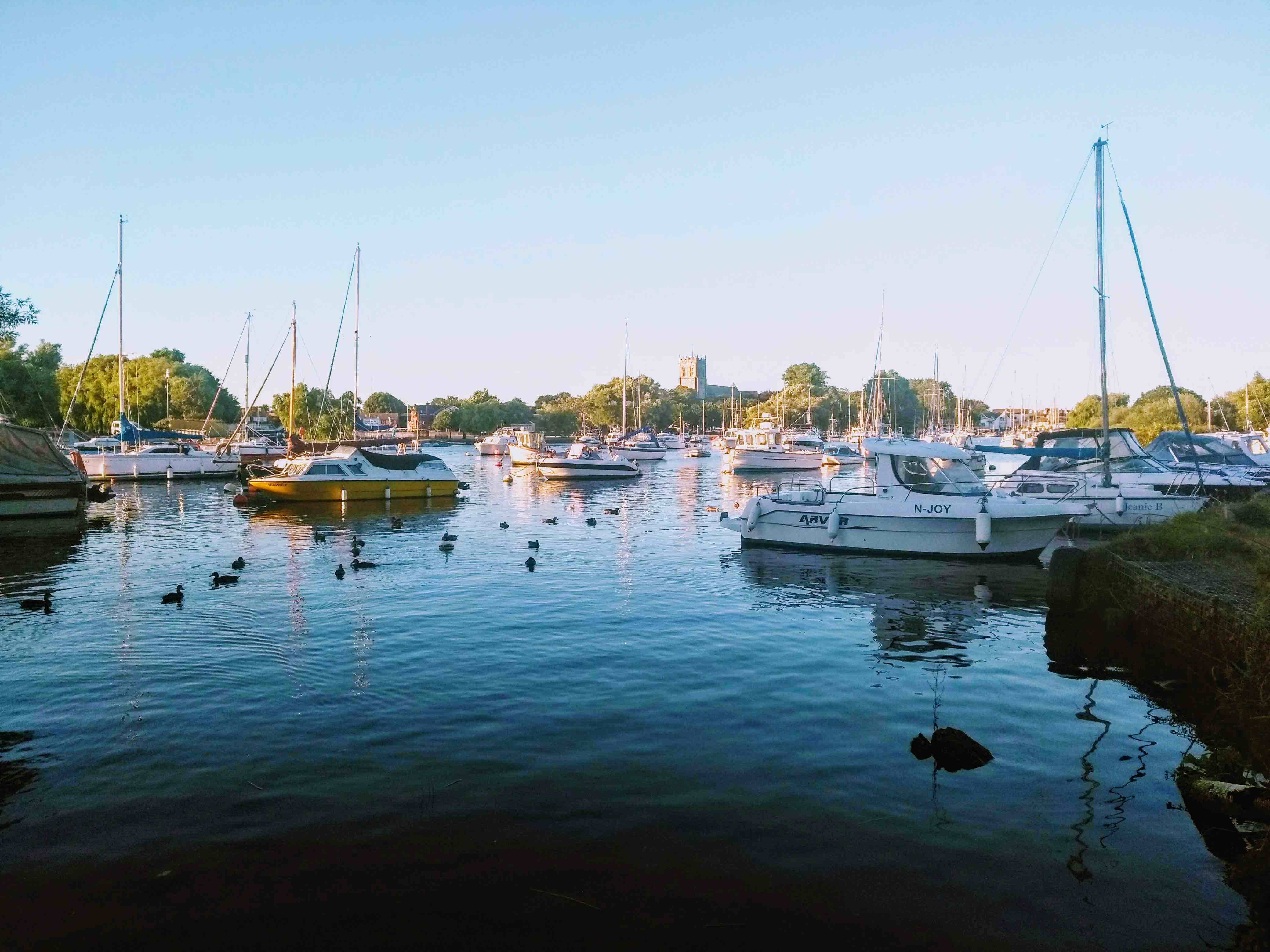 Picture of Christchurch Harbour with Priory in the background