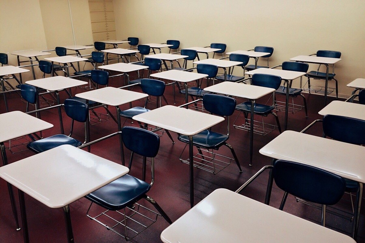 school hall with desks