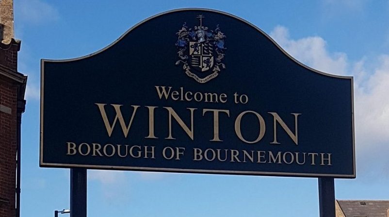 Sign showing Winton Borough of Bournemouth at top of high street