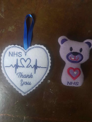 Alaine Griffin's designs of a small teddy bear and love heart emblazoned with "Thank you NHS"