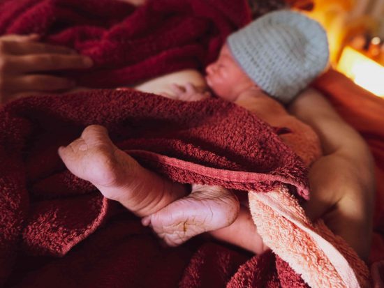 Newborn baby in towel