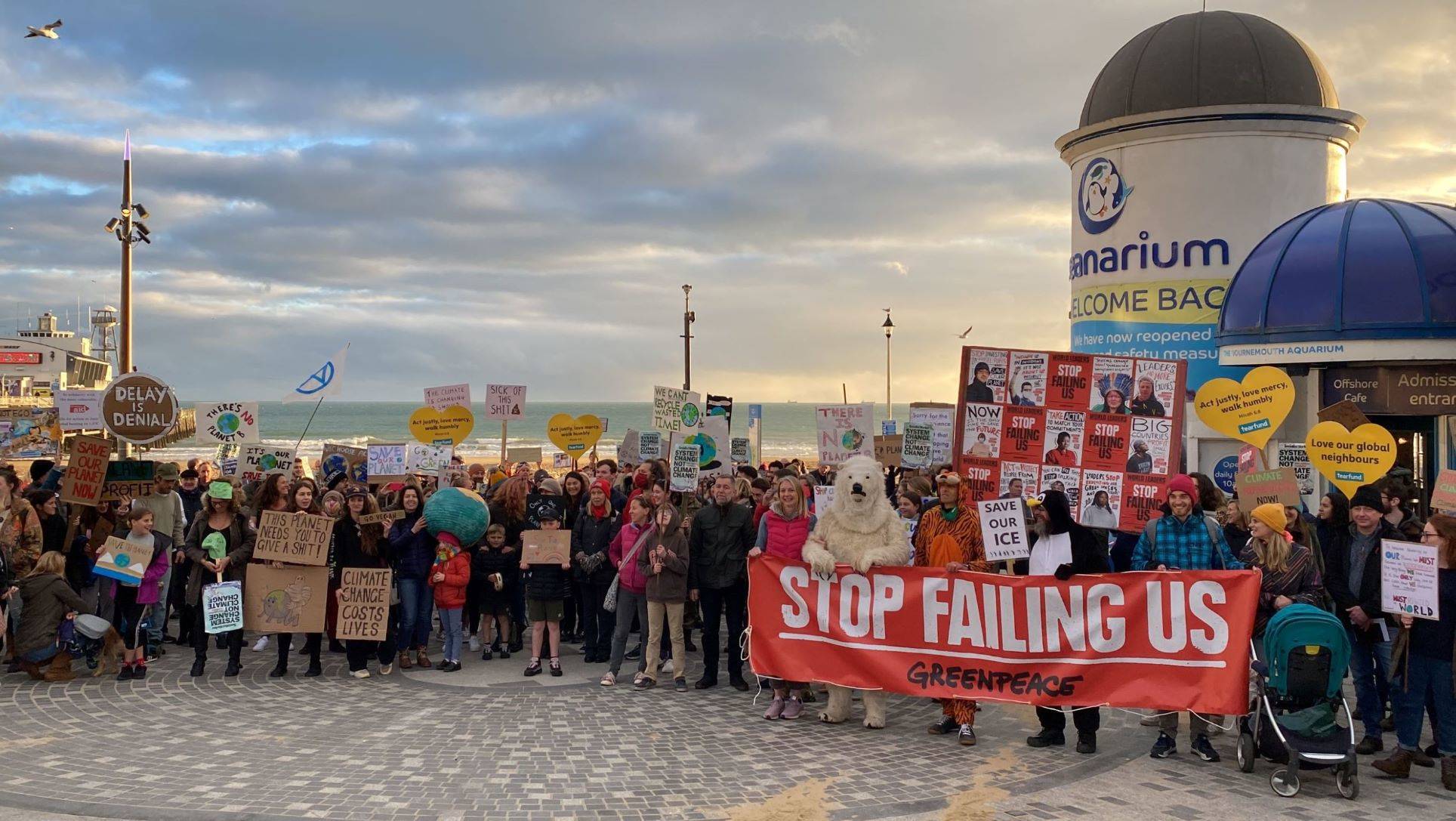 Photograph of Bournemouth COP26 Global Day for Action protestors at Bournemouth pier