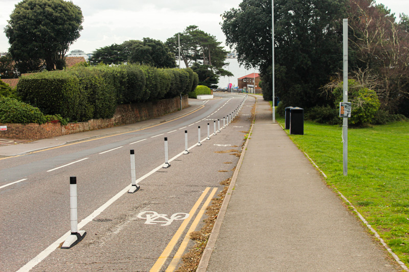 A picture of the empty Evening Hill cycle lane beside the road.