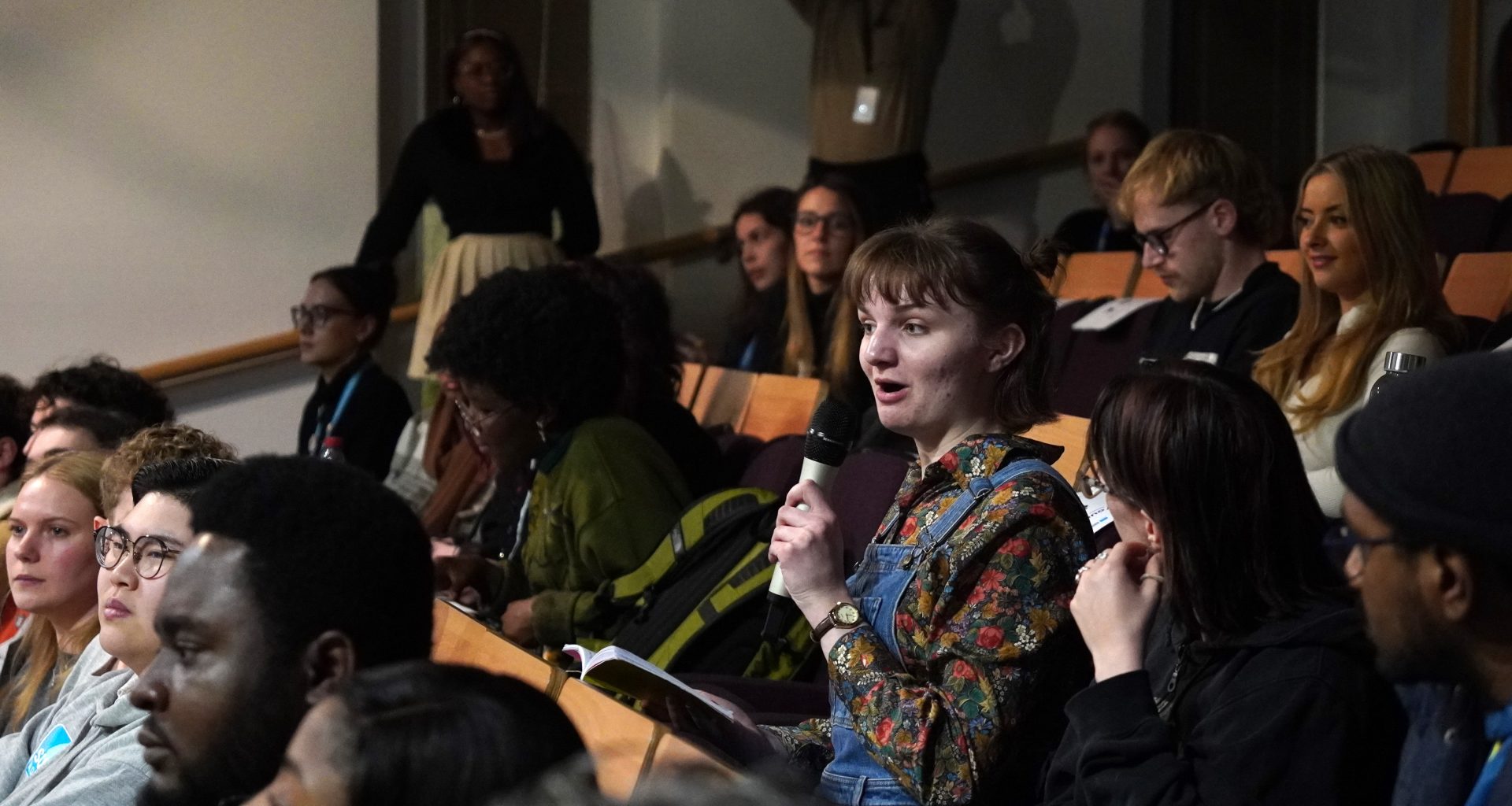 A voter asks a question at a political debate in Bournemouth, aimed at engaging the youth. Photo: Thanh Hung Nguyen